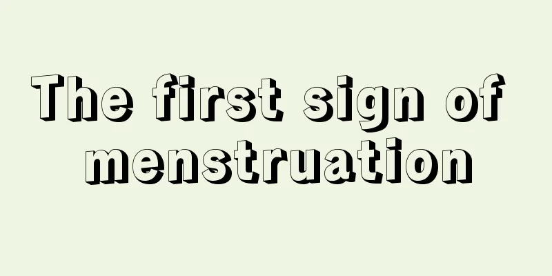 The first sign of menstruation