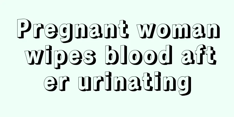 Pregnant woman wipes blood after urinating