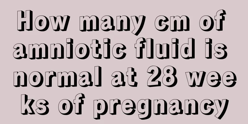 How many cm of amniotic fluid is normal at 28 weeks of pregnancy