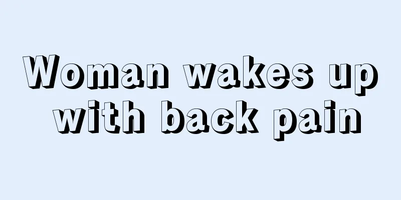 Woman wakes up with back pain