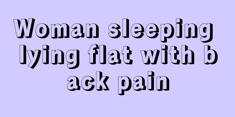 Woman sleeping lying flat with back pain