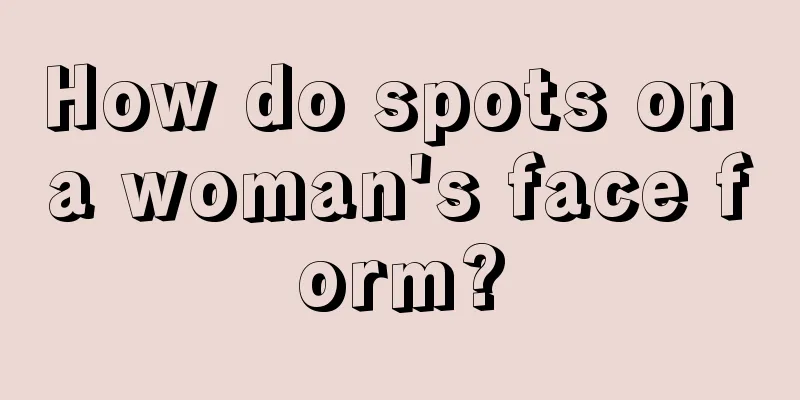 How do spots on a woman's face form?