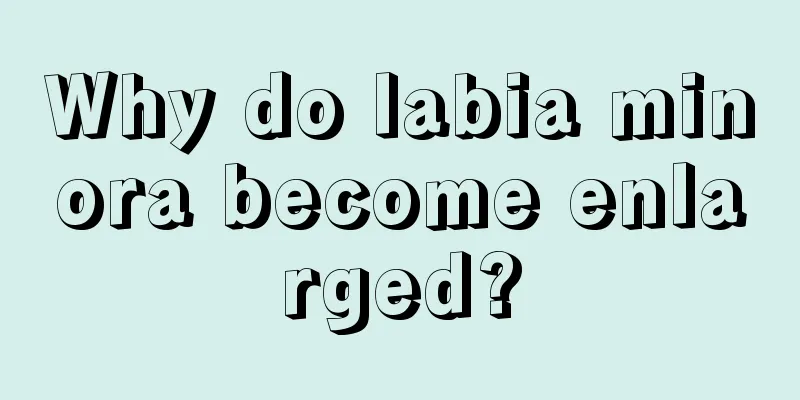 Why do labia minora become enlarged?