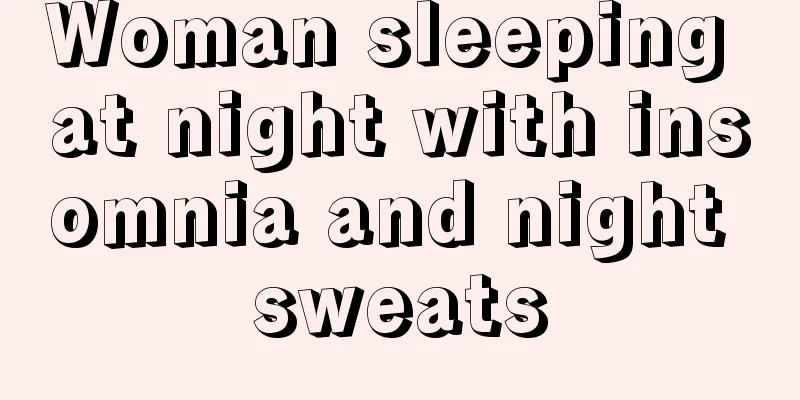 Woman sleeping at night with insomnia and night sweats