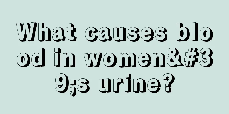 What causes blood in women's urine?