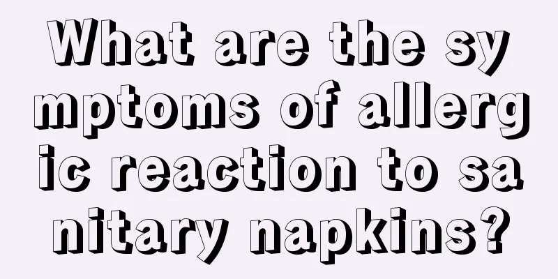 What are the symptoms of allergic reaction to sanitary napkins?