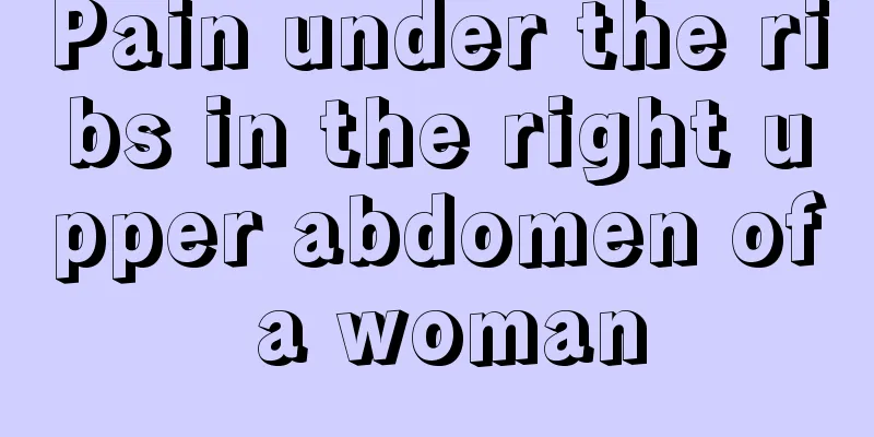 Pain under the ribs in the right upper abdomen of a woman