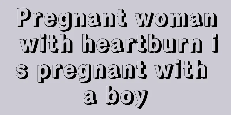 Pregnant woman with heartburn is pregnant with a boy