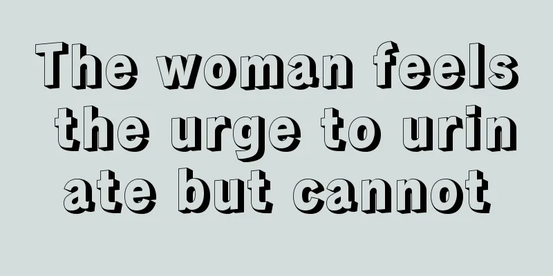 The woman feels the urge to urinate but cannot