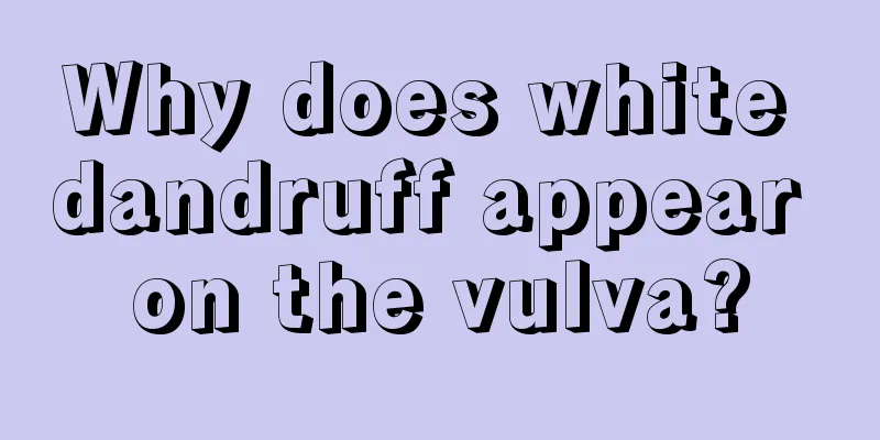 Why does white dandruff appear on the vulva?