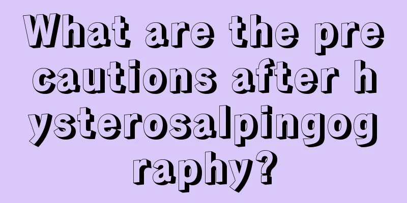 What are the precautions after hysterosalpingography?