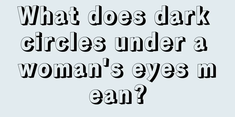 What does dark circles under a woman's eyes mean?