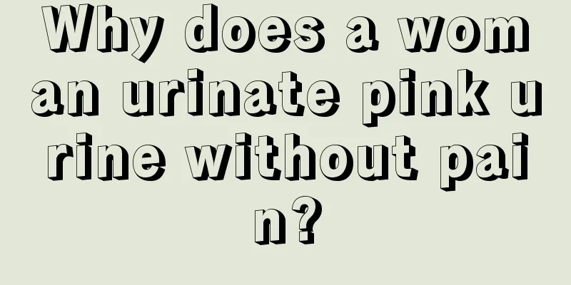 Why does a woman urinate pink urine without pain?