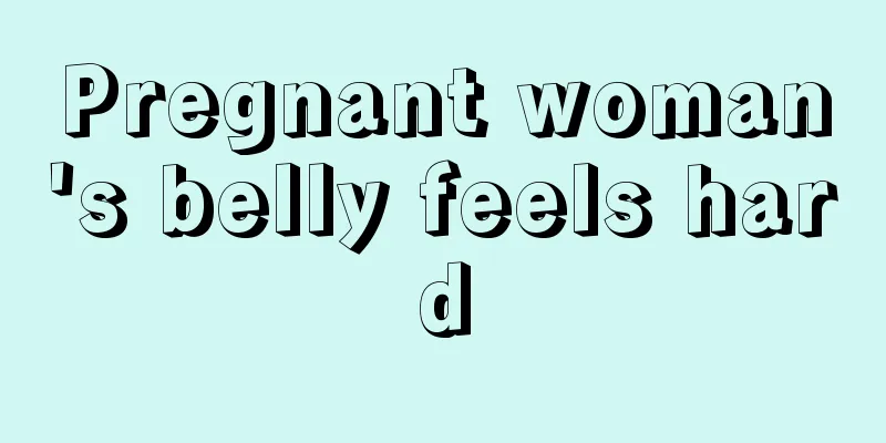 Pregnant woman's belly feels hard