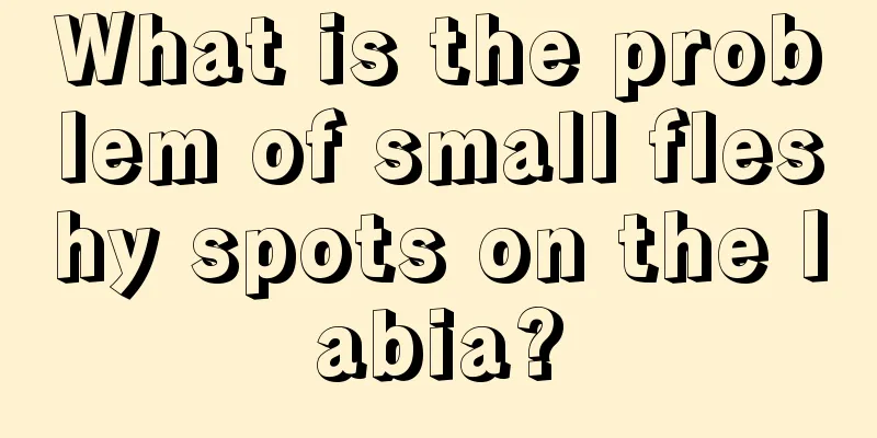 What is the problem of small fleshy spots on the labia?