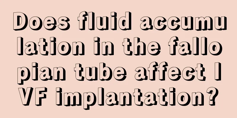 Does fluid accumulation in the fallopian tube affect IVF implantation?