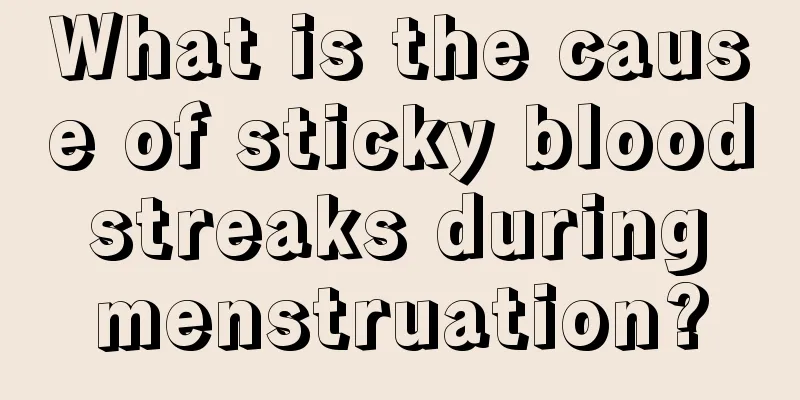 What is the cause of sticky blood streaks during menstruation?