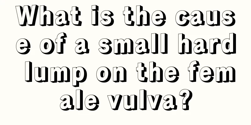 What is the cause of a small hard lump on the female vulva?