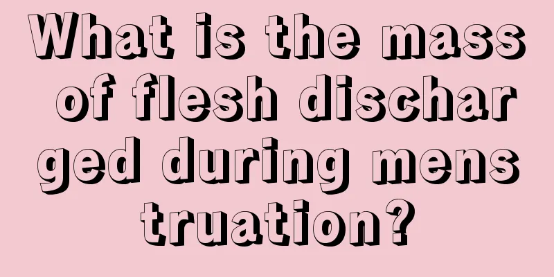 What is the mass of flesh discharged during menstruation?