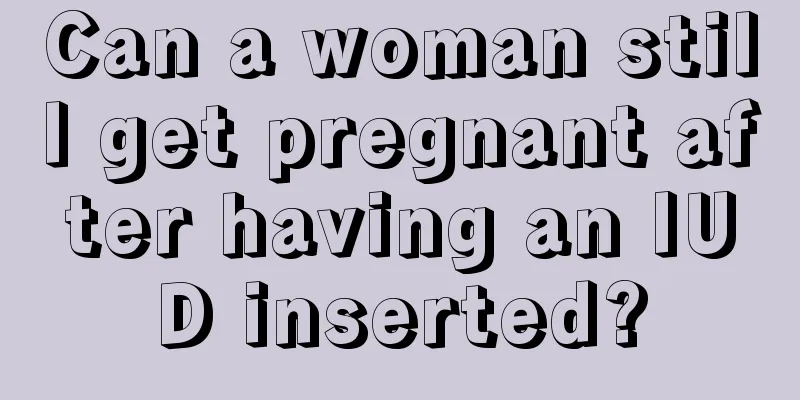 Can a woman still get pregnant after having an IUD inserted?