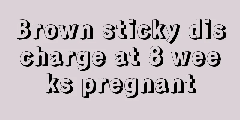 Brown sticky discharge at 8 weeks pregnant