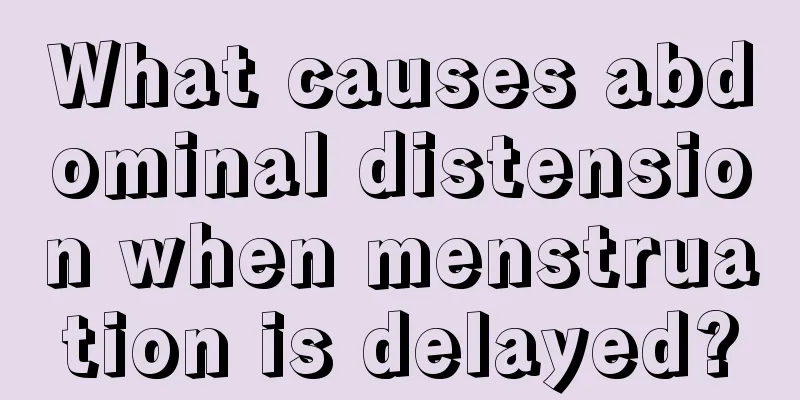 What causes abdominal distension when menstruation is delayed?