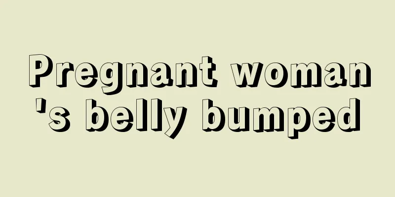 Pregnant woman's belly bumped