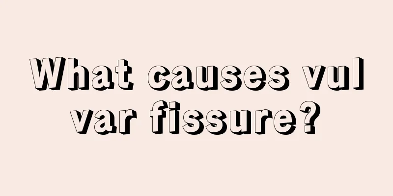 What causes vulvar fissure?