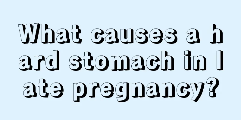 What causes a hard stomach in late pregnancy?