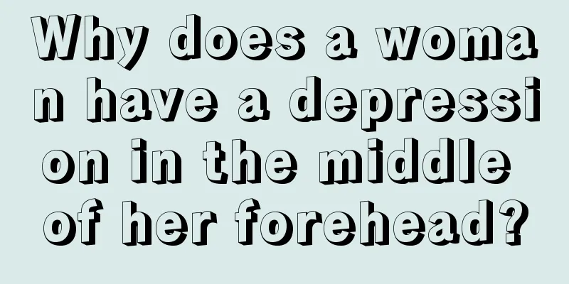 Why does a woman have a depression in the middle of her forehead?