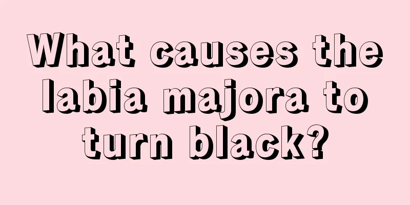 What causes the labia majora to turn black?