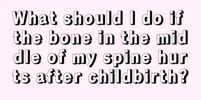 What should I do if the bone in the middle of my spine hurts after childbirth?