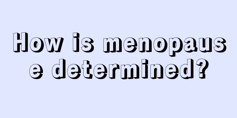 How is menopause determined?