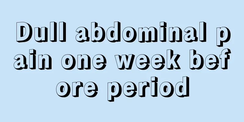 Dull abdominal pain one week before period