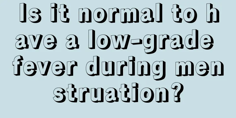 Is it normal to have a low-grade fever during menstruation?