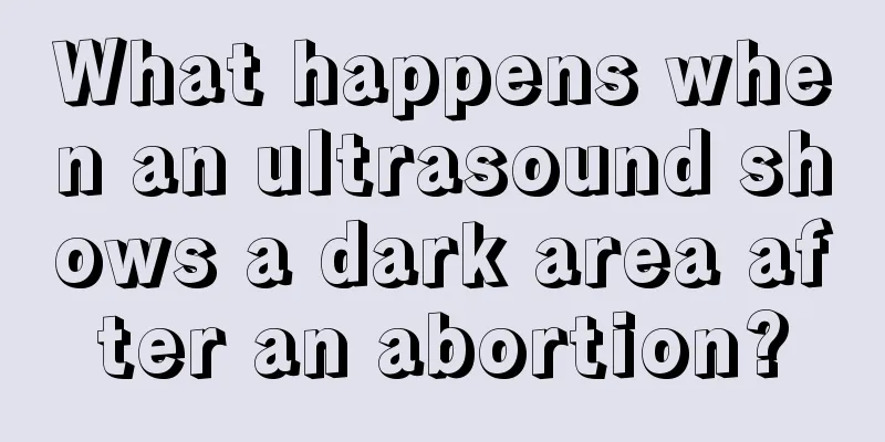 What happens when an ultrasound shows a dark area after an abortion?