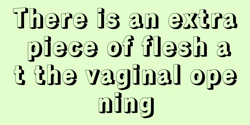 There is an extra piece of flesh at the vaginal opening