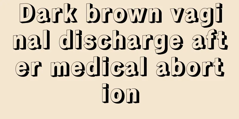 Dark brown vaginal discharge after medical abortion