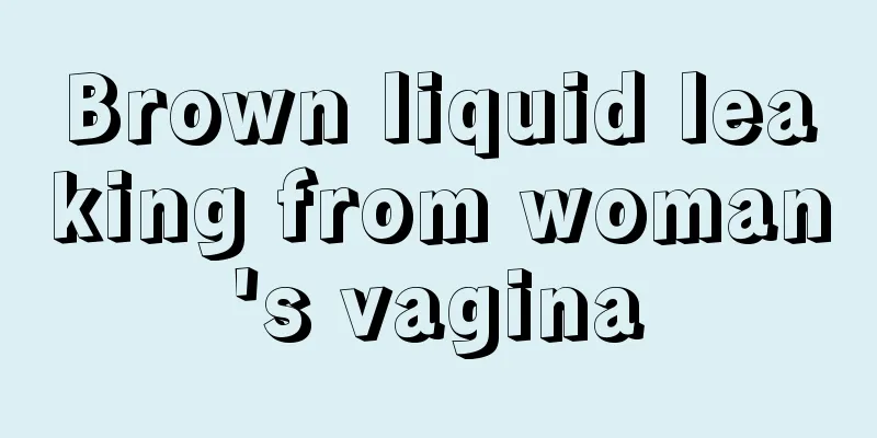 Brown liquid leaking from woman's vagina