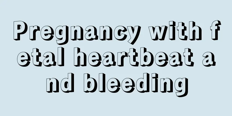 Pregnancy with fetal heartbeat and bleeding