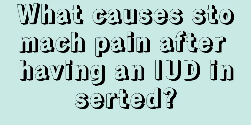 What causes stomach pain after having an IUD inserted?