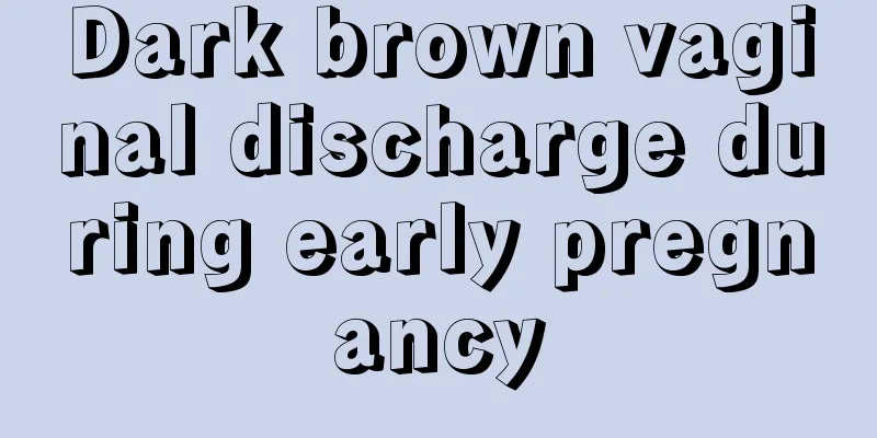 Dark brown vaginal discharge during early pregnancy