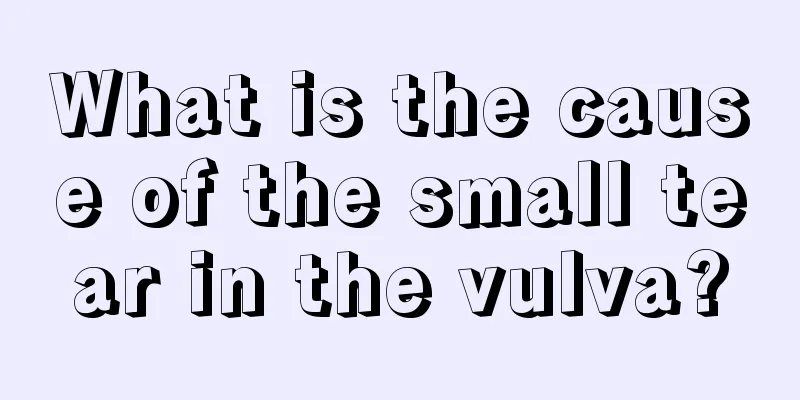 What is the cause of the small tear in the vulva?