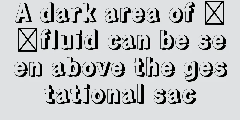A dark area of ​​fluid can be seen above the gestational sac