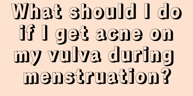 What should I do if I get acne on my vulva during menstruation?