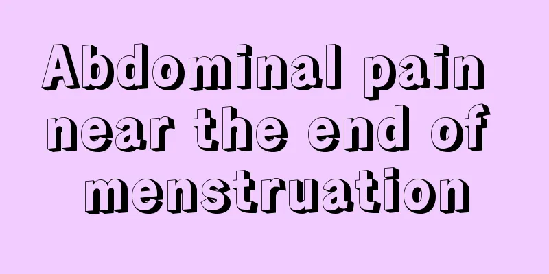 Abdominal pain near the end of menstruation