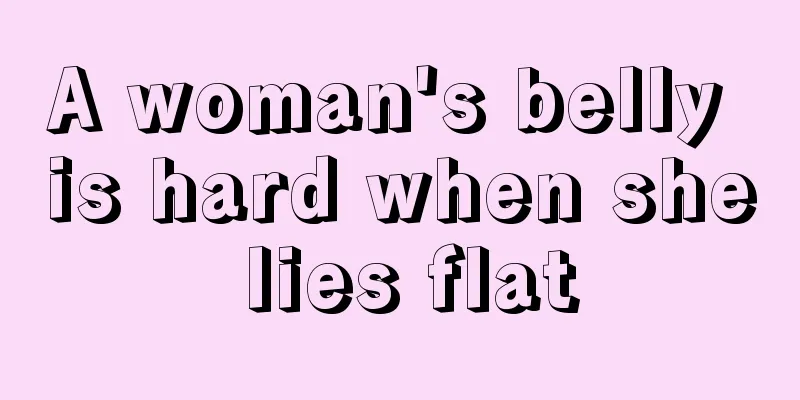 A woman's belly is hard when she lies flat