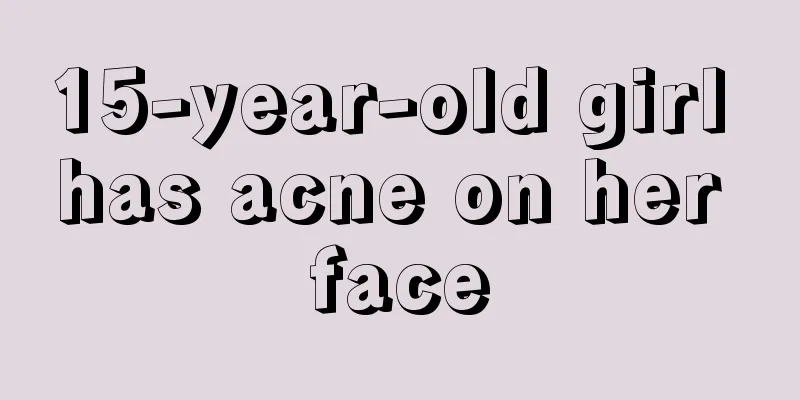 15-year-old girl has acne on her face