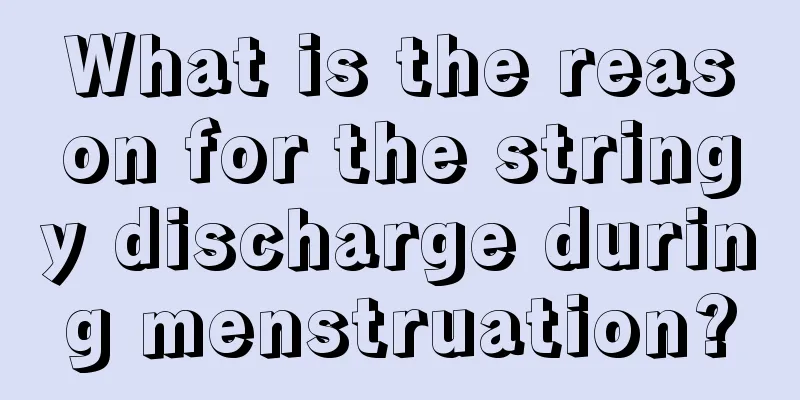 What is the reason for the stringy discharge during menstruation?