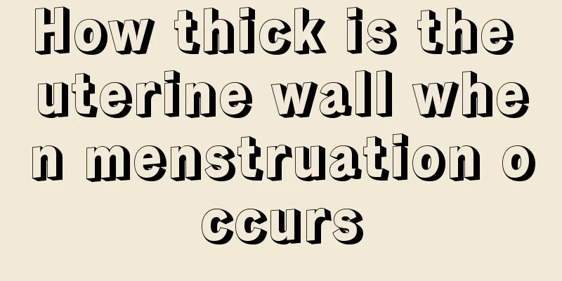 How thick is the uterine wall when menstruation occurs